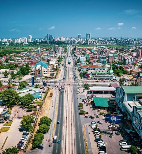 Stunning aerial view of bustling cityscape in Dar es Salaam, Tanzania, on a clear day.