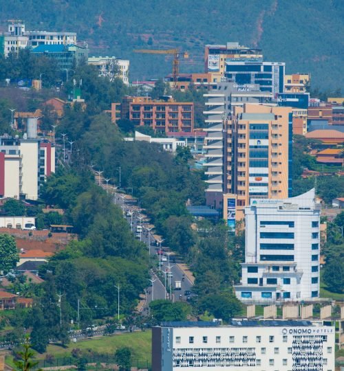 An aerial shot showcasing the modern skyline and architecture of Kigali, Rwanda.