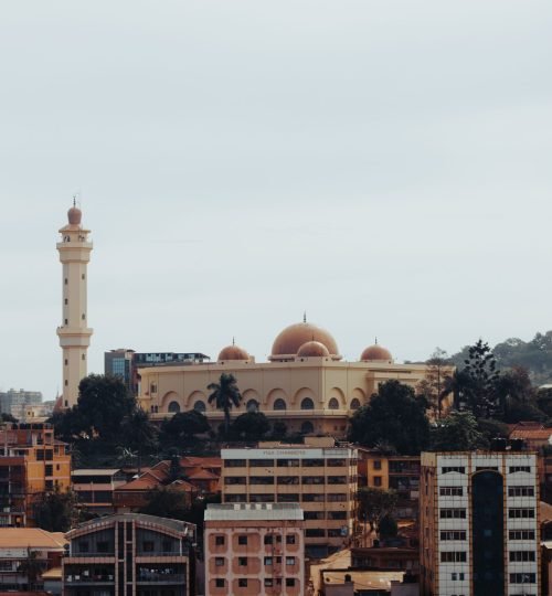 A stunning view of the ancient mosque in Kampala, showcasing its beautiful Islamic architecture.